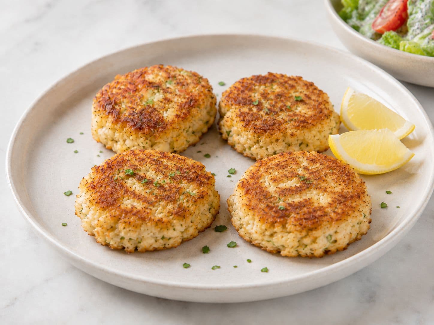 Harbor-Style Cod Cakes with Romaine-Tomato Poppyseed Salad