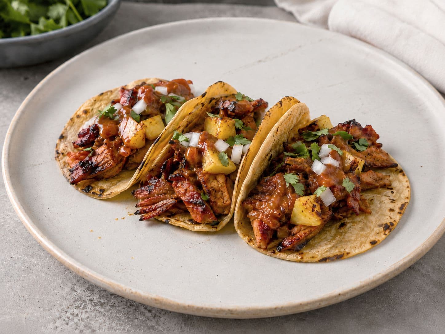 Smoky Al Pastor Pork Tacos with Pineapple & Chipotle